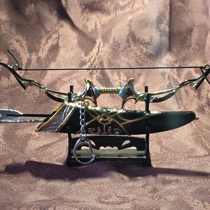 Elegant Gold and Black Decorative Crossbow